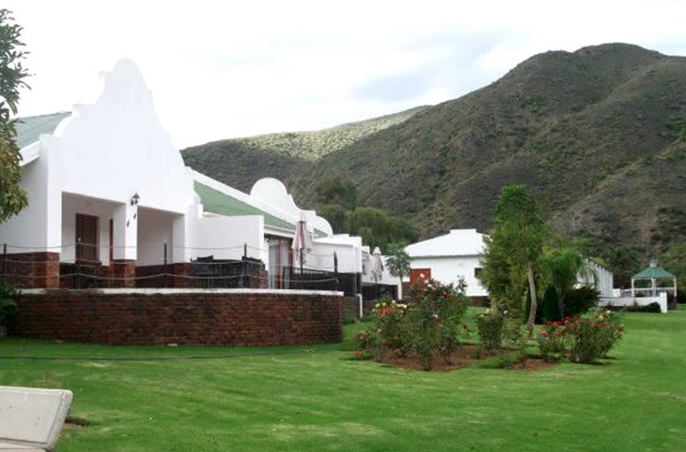 Situated in the beautiful Schoemanspoort oudshoorn, and central to all the major tourist attractions. Renowned for its mouth-watering cuisine including Ostrich Fillet and Dorper karoo Lamb. Engaging hospitality is our hallmark. Come and rest below the majestic foothills of the Swartberg. An unforgettable experience!.